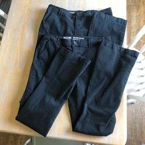 Black mid-rise bootcut pants, both pair